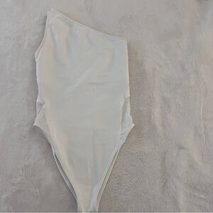 WHITE NIKE ONE SHOULDER BODYSUIT